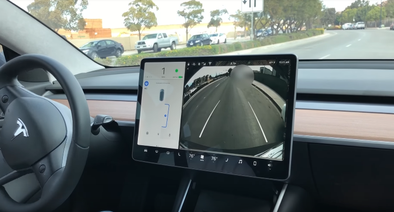 Watch .. Tesla Model 3 parking on its own