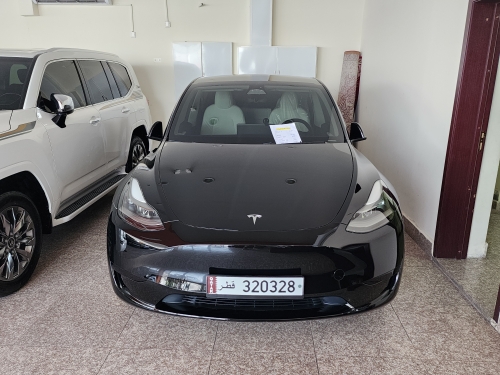 Tesla Model Y... 2024
